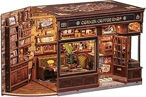 Book Nook Kit - coffee shop 3D Wooden Bookshelf Decor - DIY miniature house kit with LED lights displayed on a white background