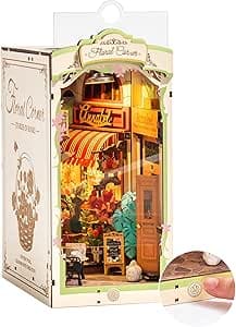 DIY Book Nook Kit - Bookshelf Insert Decor - DIY miniature house kit with LED lights displayed on a white background